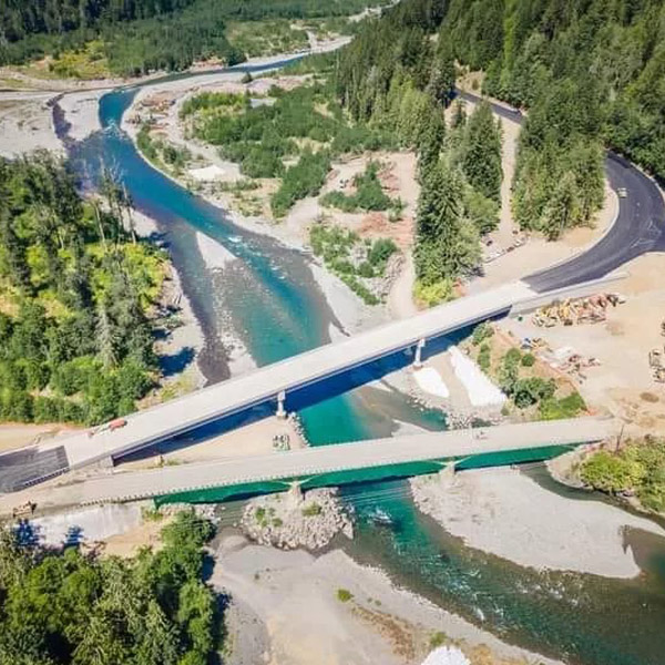 A small logo depicting the news story HIGHWAY 101 REOPENS AT ELWHA RIVER BRIDGE