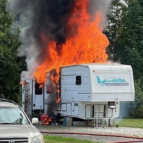 A large logo depicting the news story SEQUIM RESIDENT BURNED IN RV FIRE, AIRLIFTED TO HARBORVIEW